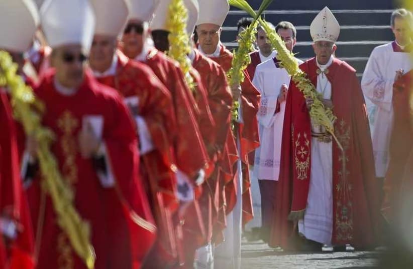 Pope Francis leads the Palm Sunday mass at Saint Peter's Square at the Vatican (photo credit: REUTERS)