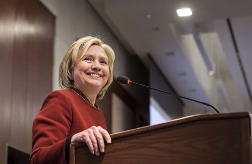 Former US Secretary of State Hillary Clinton delivers remarks during the 2015 Toner Prize for Excellence in Political Reporting award in Washington March 23 (photo credit: REUTERS)