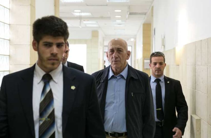 Former prime minister Ehud Olmert in the Talansky retrial, March 30, 2011. (photo credit: MOR SHAULI)