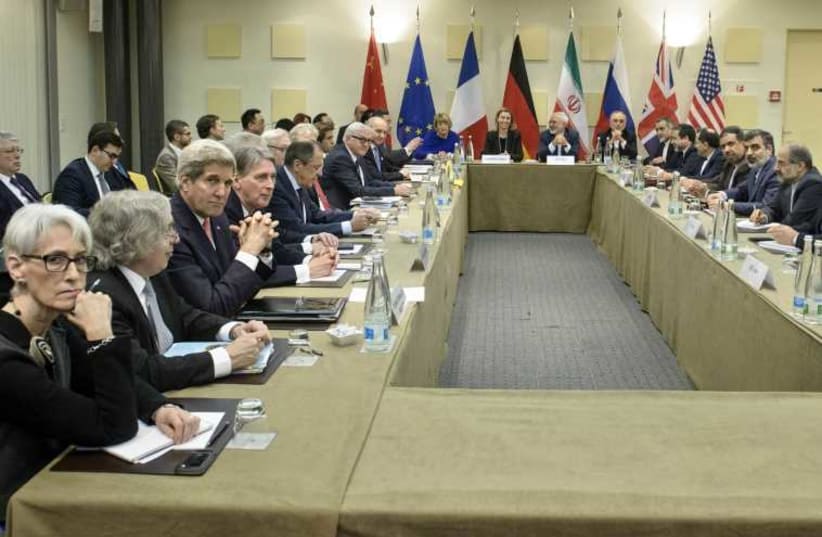 Officials in talks on Iran's nuclear program at the Beau Rivage Palace Hotel in Lausanne, March 30, 2015  (photo credit: REUTERS)