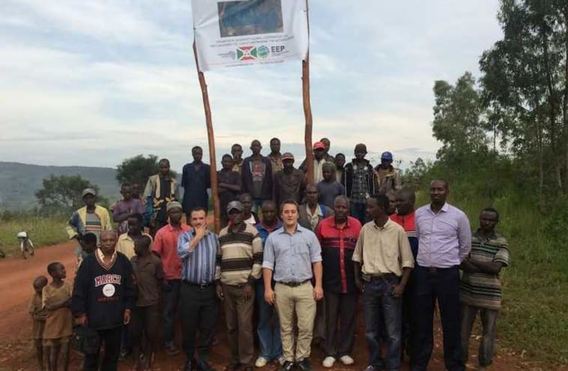  Gigawatt Global managing director Michael Fichtenberg (second from left) with Burundian government officials.   (photo credit: GIGAWATT GLOBAL)