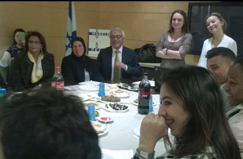 LATIFA IBN ZIATEN and Ambassador Yossi Gal (third and fourth from left) participate in a workshop yesterday at the Israeli Embassy in Paris for a group of French students heading to Israel later this month. (photo credit: RINA BASSIST)