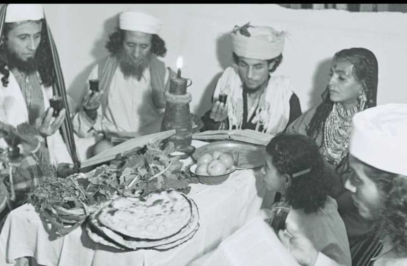 A Yemenite Habani family celebrates Passover in Tel Aviv on April 1, 1946, after recently immigrating to Israel. (photo credit: GPO FLICKR/KLUGER ZOLTAN)