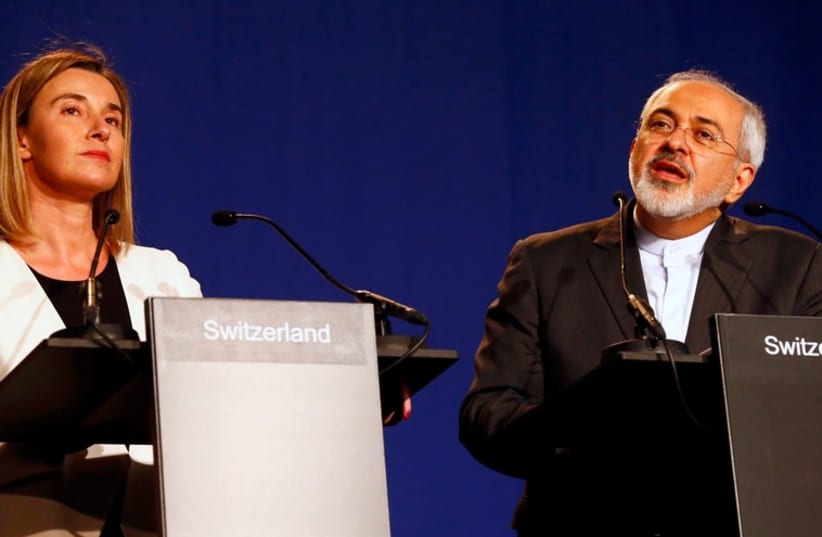 Eu's Mogherini and Iran's Zarif, April 2, 2015 (photo credit: REUTERS)