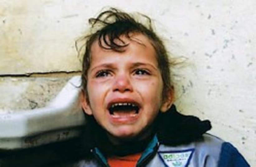 palestinian girl crying 248 ap (photo credit: AP)
