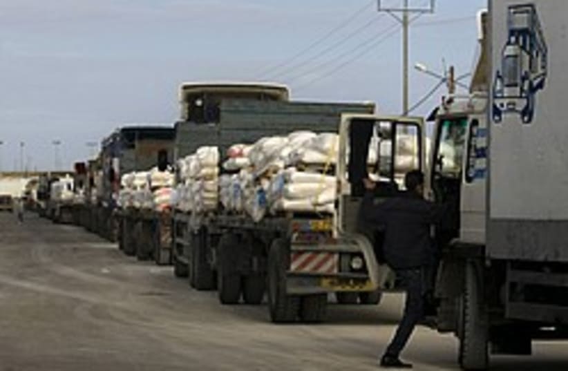 gaza aid trucks kerem shalom 248 88 ap (photo credit: AP)
