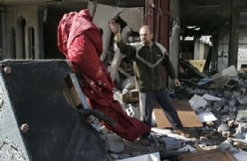 gazan searches bombed house 248.88ap (photo credit: AP)