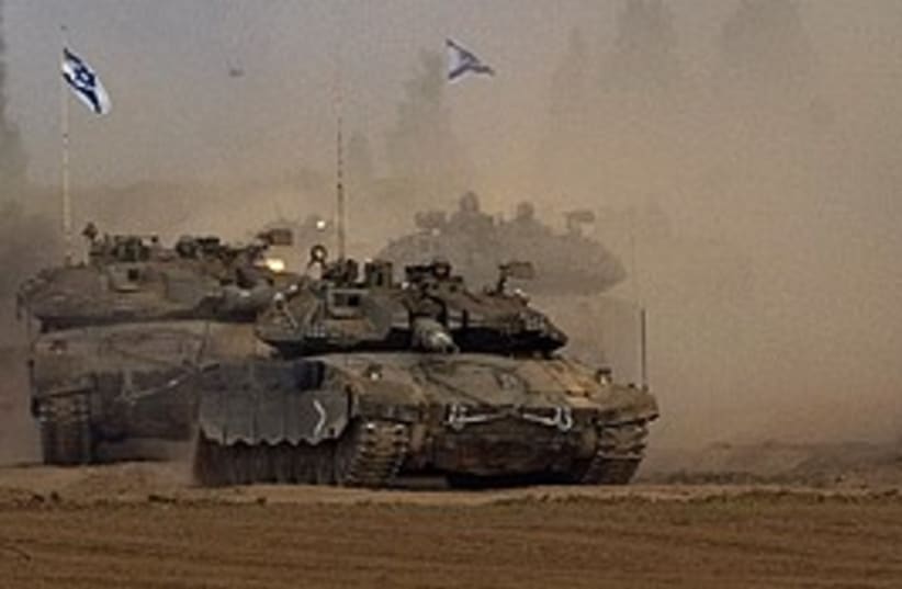 idf tanks return from gaza 298 ap (photo credit: AP)