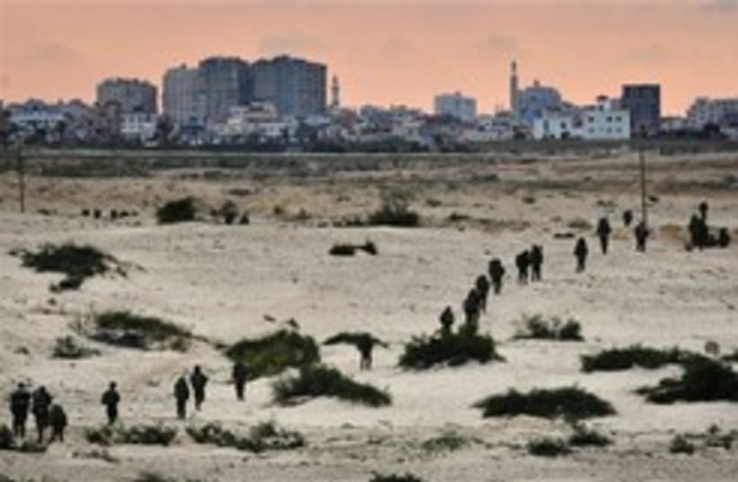 idf soldiers gaza walking beach 248.88ap (photo credit: AP [file])