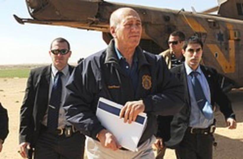 Olmert get off chopper 248.88 (photo credit: GPO)