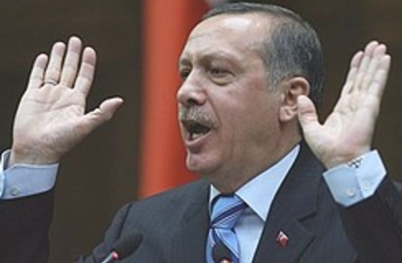 erdogan hands up 248.88 (photo credit: AP)