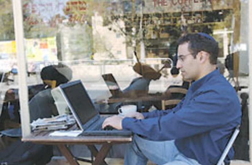 man using laptop 88 248 (photo credit: Ariel Jerozolimski)