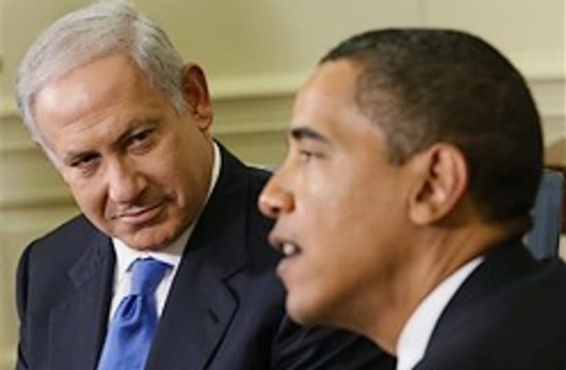 netanyahu listens to obama 248.88 (photo credit: AP)
