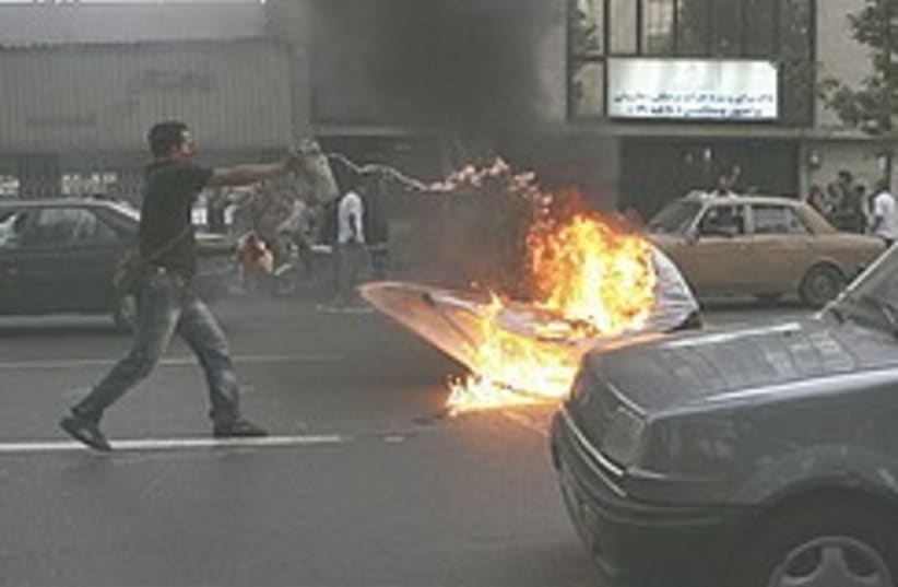 Iran riots fire 248.88 (photo credit: AP)