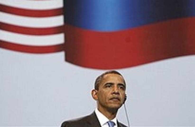 Obama russia flags 248.88 (photo credit: AP)