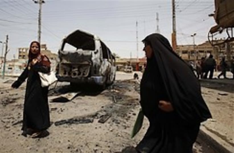 Baghdad bombed bus 248.88 (photo credit: AP)