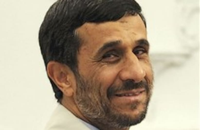 ahmadinejad smiles 248.88 (photo credit: AP)