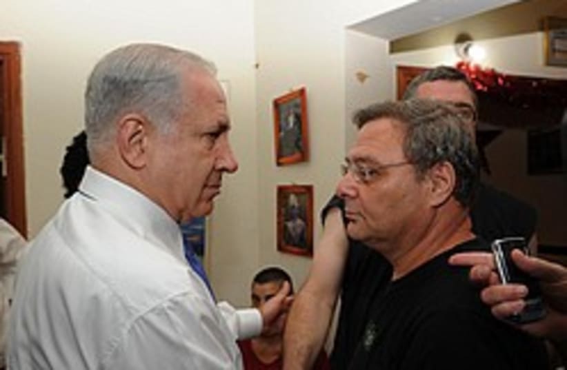 netanyahu visits gay center 248.88 (photo credit: GPO)