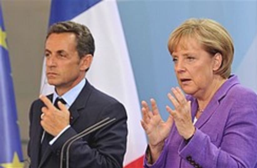 Merkel and Sarkozy gesture 248.88 (photo credit: )
