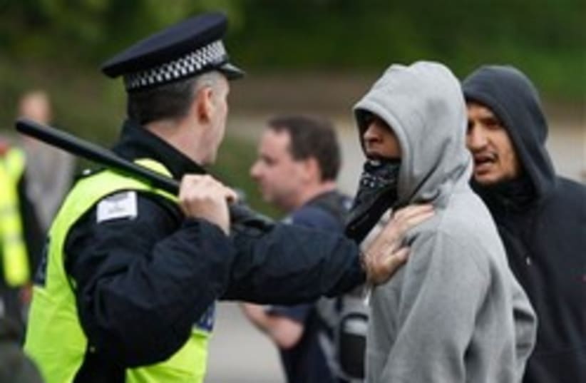 uk police muslim youth demonstration  (photo credit: AP)