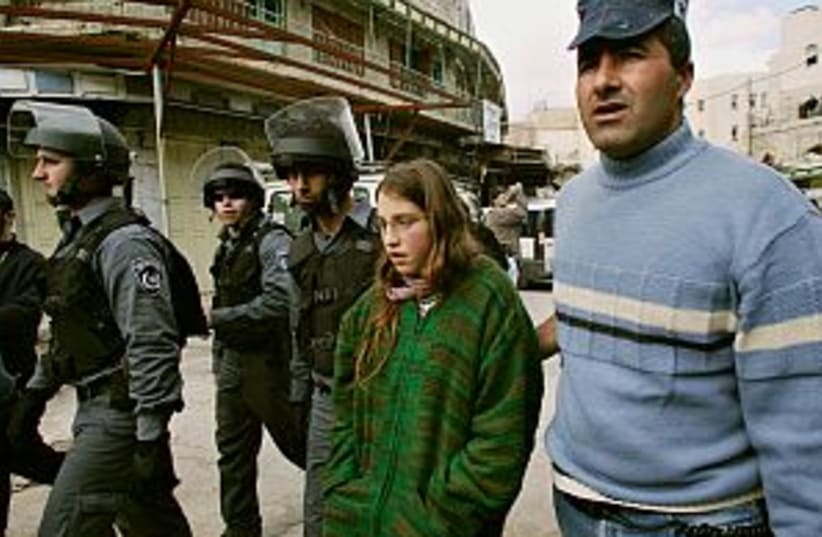 police arrest settler  (photo credit: AP)