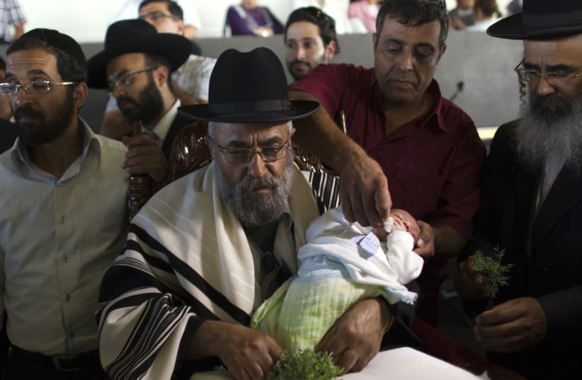 Circumcision in Israel (photo credit: REUTERS/Ronen Zvulun)