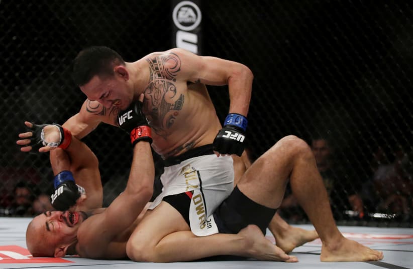 Mixed Martial Arts (MMA) fighters. (photo credit: RICARDO MORAES/REUTERS)