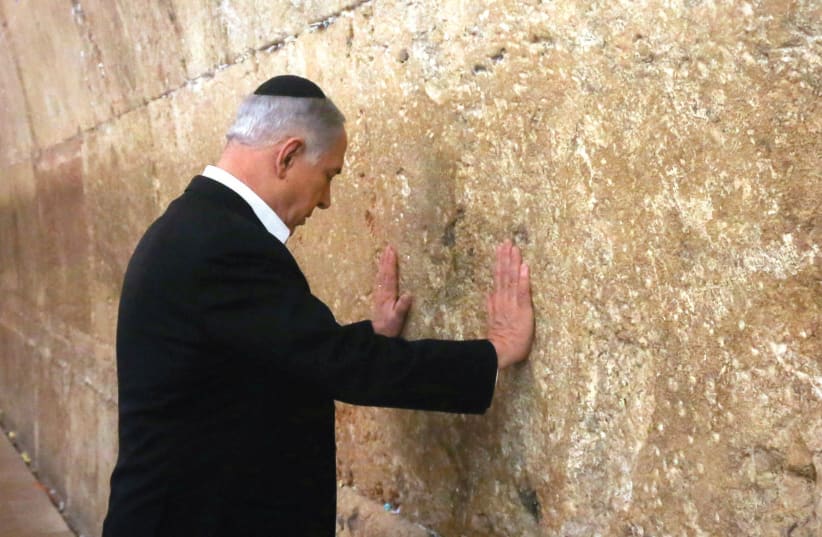 PRIME MINISTER Benjamin Netanyahu at the Kotel (photo credit: MARC ISRAEL SELLEM)