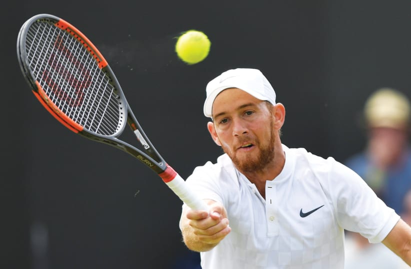 DUDI SELA’S impressive run at Wimbledon came to an end yesterday, as the 32-year-old Israeli fell to Bulgaria’s Grigor Dimitrov, retiring after losing the first two sets 6-1, 6-1. (photo credit: REUTERS)