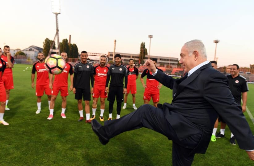 Prime Minister Benjamin Netanyahu visits a soccer practice in Hungary (photo credit: PMO)