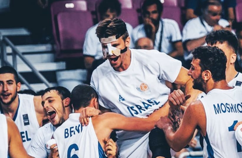 Israel players celebrate yesterday after advancing to the under-20 European Championship final in Crete, Greece. (photo credit: Courtesy)