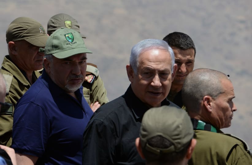 Defense Minister Avigdor Liberman and Prime Minister Benjamin Netanyahu in a tour of Mt. Hermon and Golan IDF positions. (photo credit: DEFENSE MINISTRY)