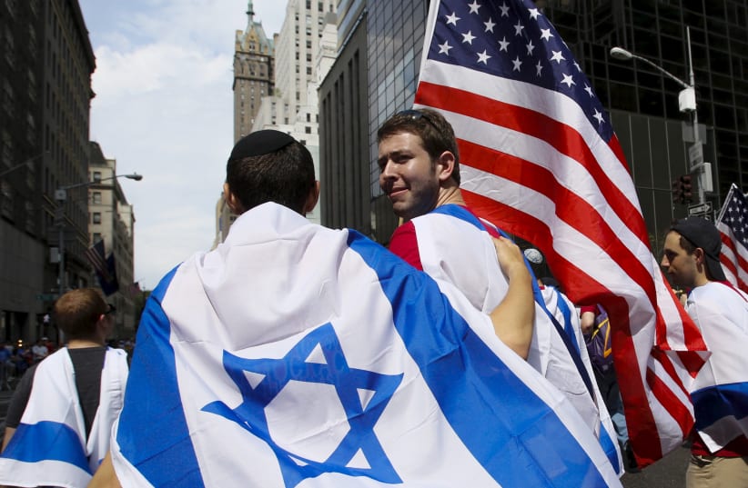 People take part in the 51st annual Israel parade in Manhattan, New York May 31, 2015. (photo credit: REUTERS)