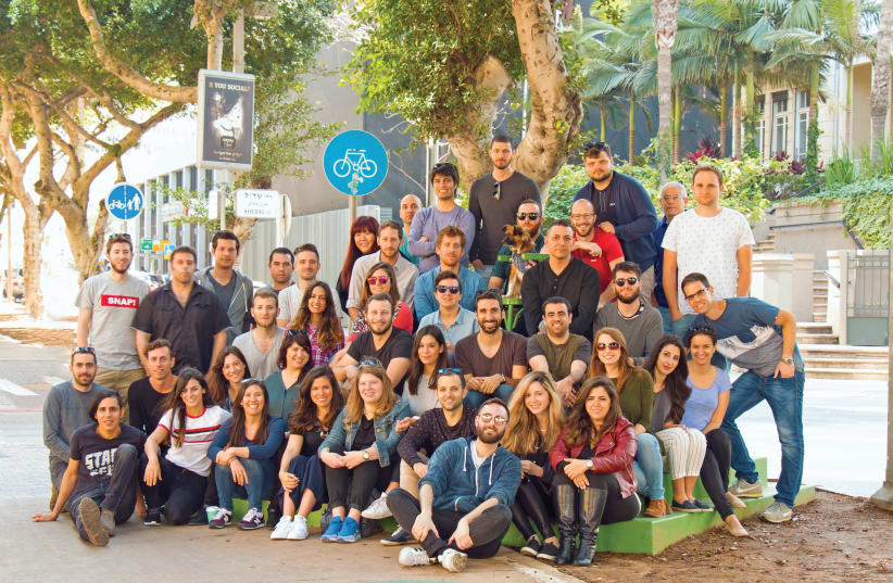 MEMBERS OF the dapulse team. The Israeli start-up has designed a web and mobile app that builds collaboration and transparency in the workplace (photo credit: Courtesy)