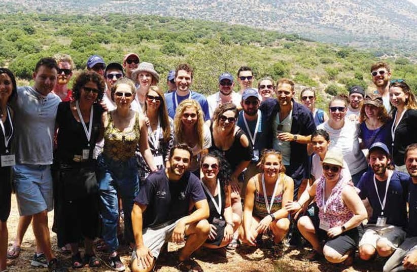 JNFuture members pose with volunteers of Hashomer Hahadash, a JNF-USA sponsored project, while touring the Galilee (photo credit: BOB BENEDON)