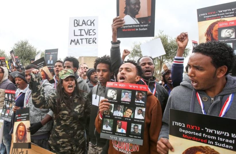 Sudanese and Eritreans in Israel protest their treatment in front of the Knesset (photo credit: MARC ISRAEL SELLEM/THE JERUSALEM POST)
