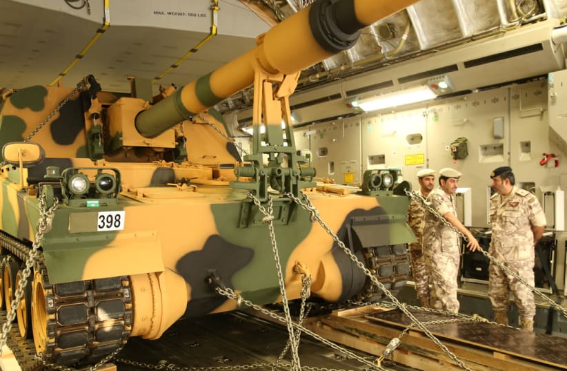A tank arrives at the Turkish military base in Doha, Qatar (photo credit: QATAR NEWS AGENCY/HANDOUT VIA REUTERS)