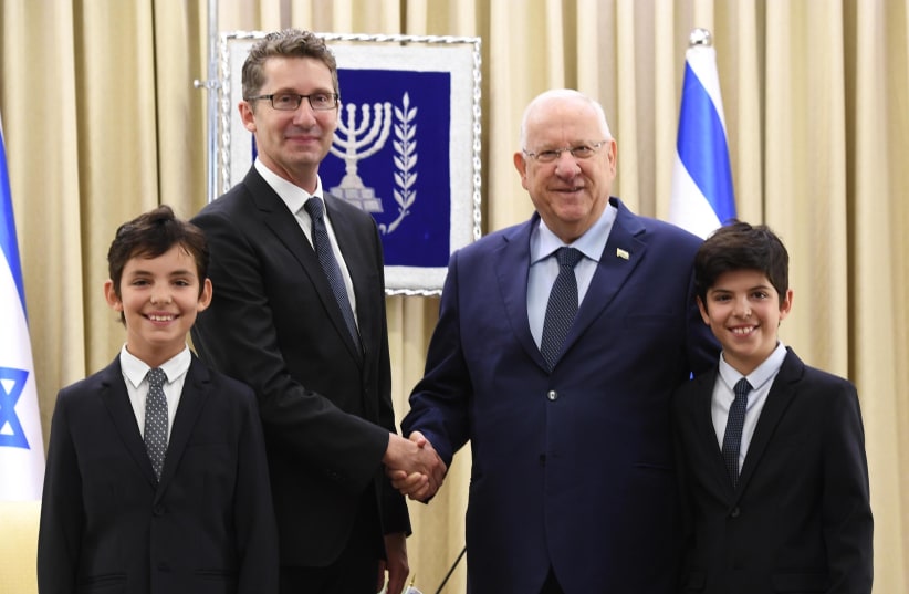 Australian ambassador Chris Cannan with his twin sons Nicholas and Alexander following the presentation of his credentials to President Reuven Rivlin (photo credit: Mark Neiman/GPO)
