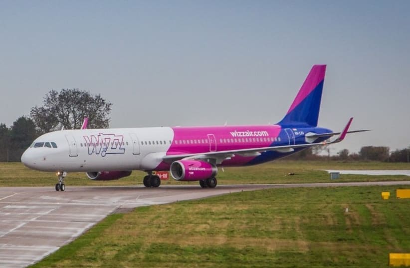 Wizz Air plane seen on the runway (photo credit: COURTESY OF WIZZ AIR)