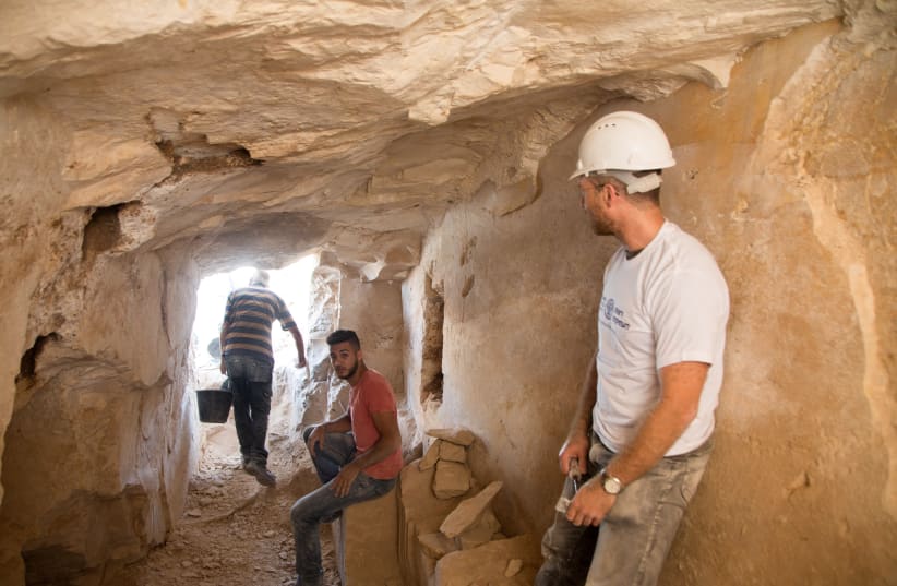 Archaeological excavations inside the ancient workshop. (photo credit: Israel Antiquities Authority)