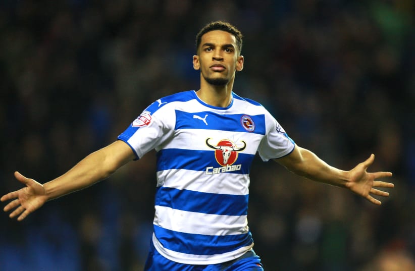 Nick Blackman celebrates scoring the first goal for Reading (photo credit: DAVID FIELD / REUTERS)