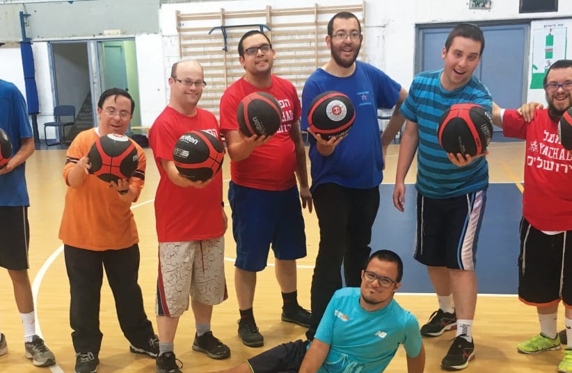 Once a week, Yachad kids participate in English-language basketball training as part of a joint program with Hapoel Jerusalem. (photo credit: OU ISRAEL)