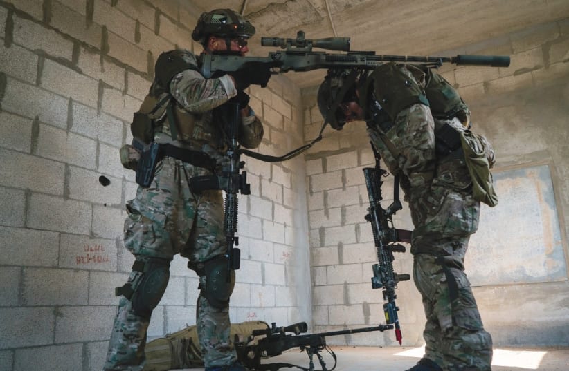 THE IDF’S ELITE Duvdevan unit and the Czech Armed Force’s 601st Special Forces Group train together recently in urban-warfare techniques at Tze’elim Army Base in the Negev. (photo credit: IDF)