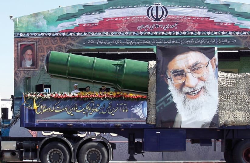 THEY ARE right-wing also. The Iranian regime celebrating its missiles (photo credit: REUTERS)