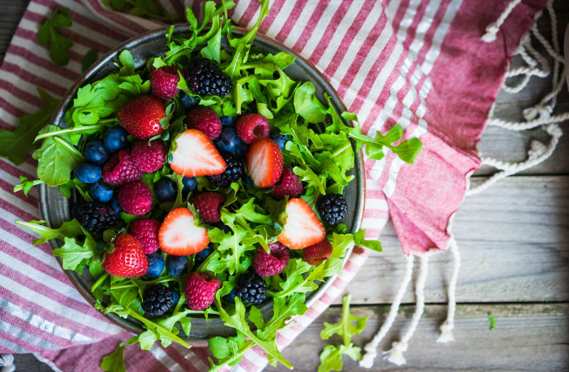 Green salad with arugula and berries (photo credit: INGIMAGE)
