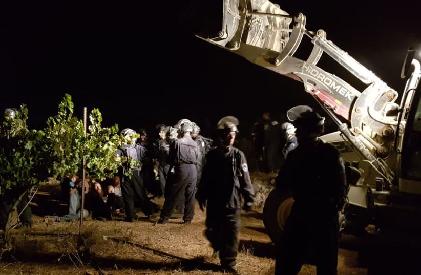 IDF and Border Police demolishing on Tuesday two illegally built homes in the West Bank outpost near the Yitzhar settlement  (photo credit: COURTESY HAKOL HAYEHUDI)