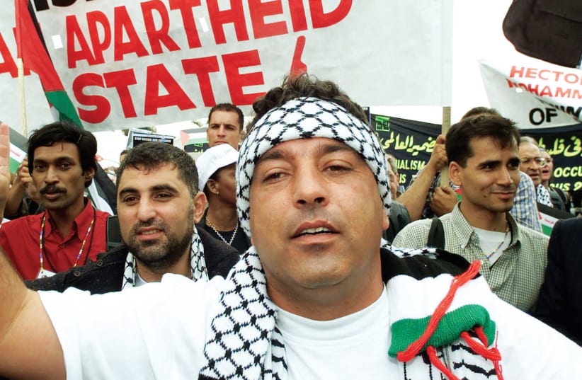 Anti-Israel demonstrators at the World Conference on Racism in Durban, South Africa, in 2001; Muslim anti-Zionism is picking up from where Christian antisemitism left off. (photo credit: REUTERS)