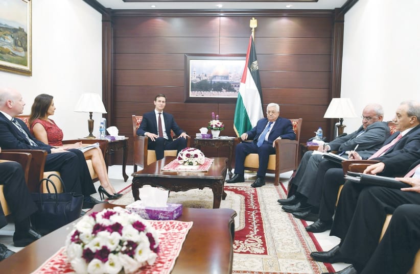 PA President Mahmoud Abbas with US presidential adviser Jared Kushner and lead negotiator Jason Greenblatt in Ramallah (photo credit: REUTERS)