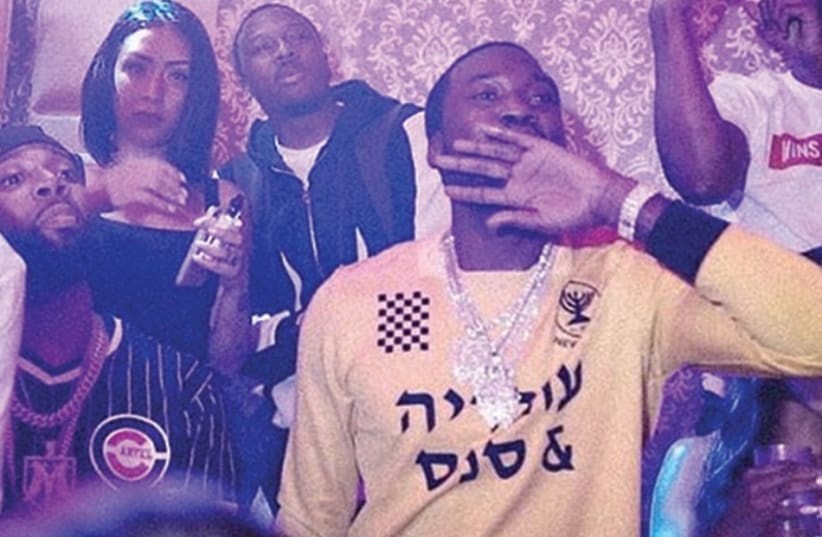 Meek Mill is seen wearing a Hebrew-emblazoned shirt reading ‘Ovadia and Sons.’ (photo credit: INSTAGRAM)