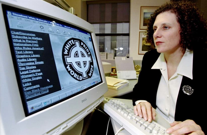 Anti-Defamation League Civil Rights Counsel Lauren Levin looks at a white supremacist web site run by an organization called Stormfront. (photo credit: REUTERS)